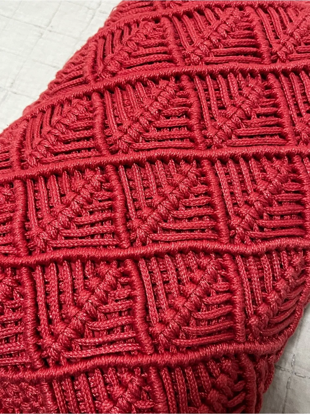 Textured macrame coral pillow